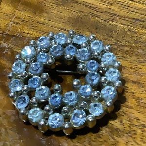 Vintage blue rhinestone pin in silver tone setting